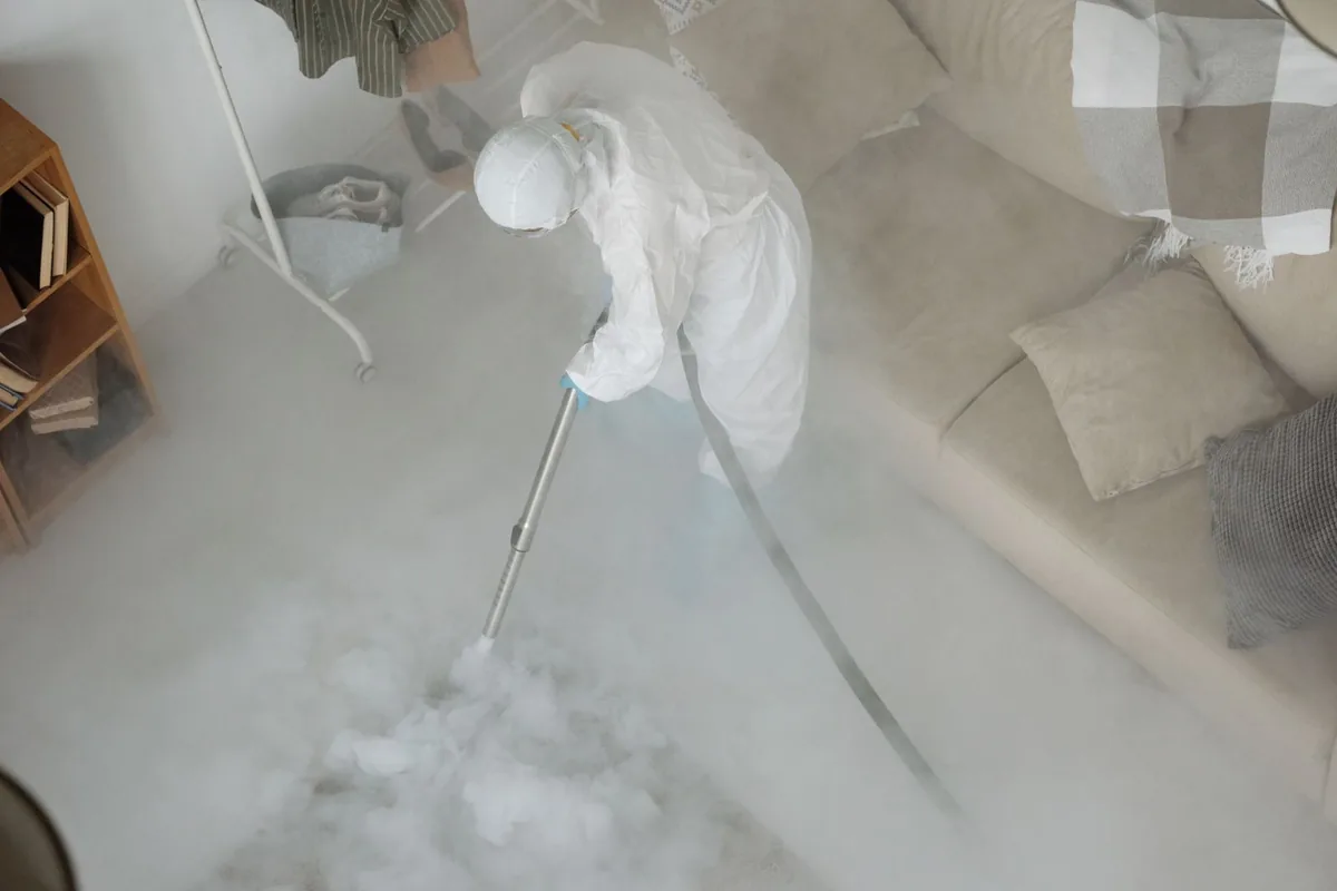 Biohazard cleanup technician in protective equipment, Westbury, NY
